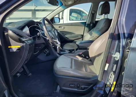 2015 Hyundai Santa Fe Sport from USA, damaged, VIN 5XYZUDLA7FG285886